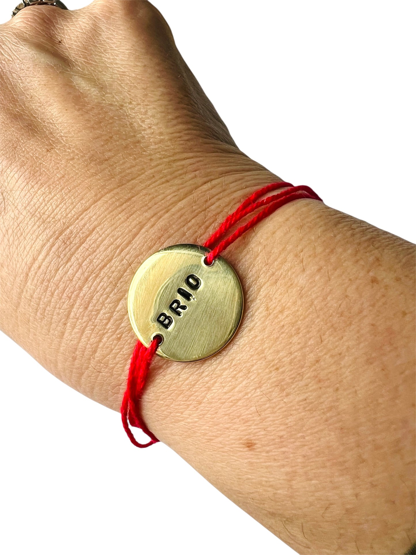 bracciale VIOLA'S CHARME a nastro con piastrina tonda in ottone "brio" incisa a mano